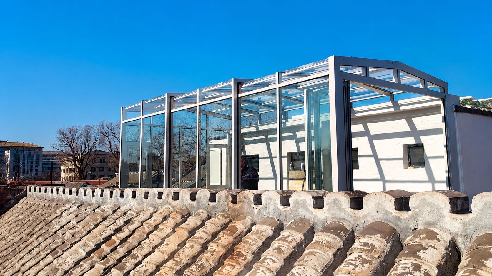 Retractable sunroom installed on a villa terrace with open panels
